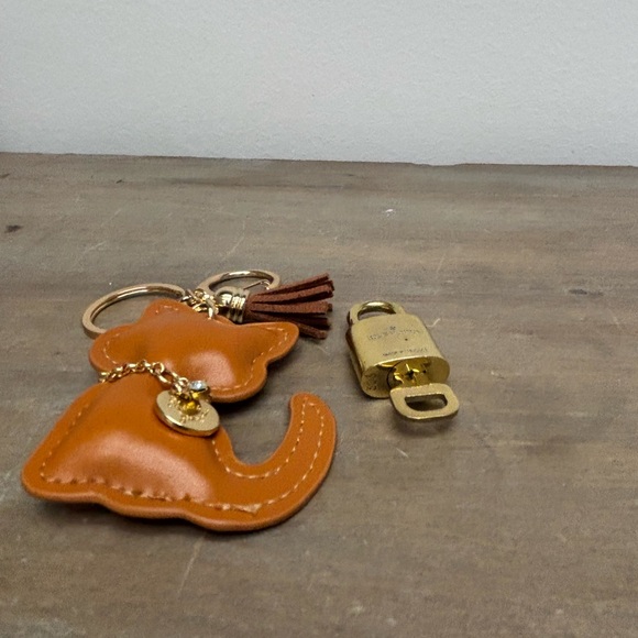 Authentic Louis Vuitton Lock Key Burnt Orange Cat Tassel, Bag Charm,Key Chain - Picture 5 of 9